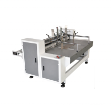 Automatic partition slotter machine for corrugated paperboard partitioner